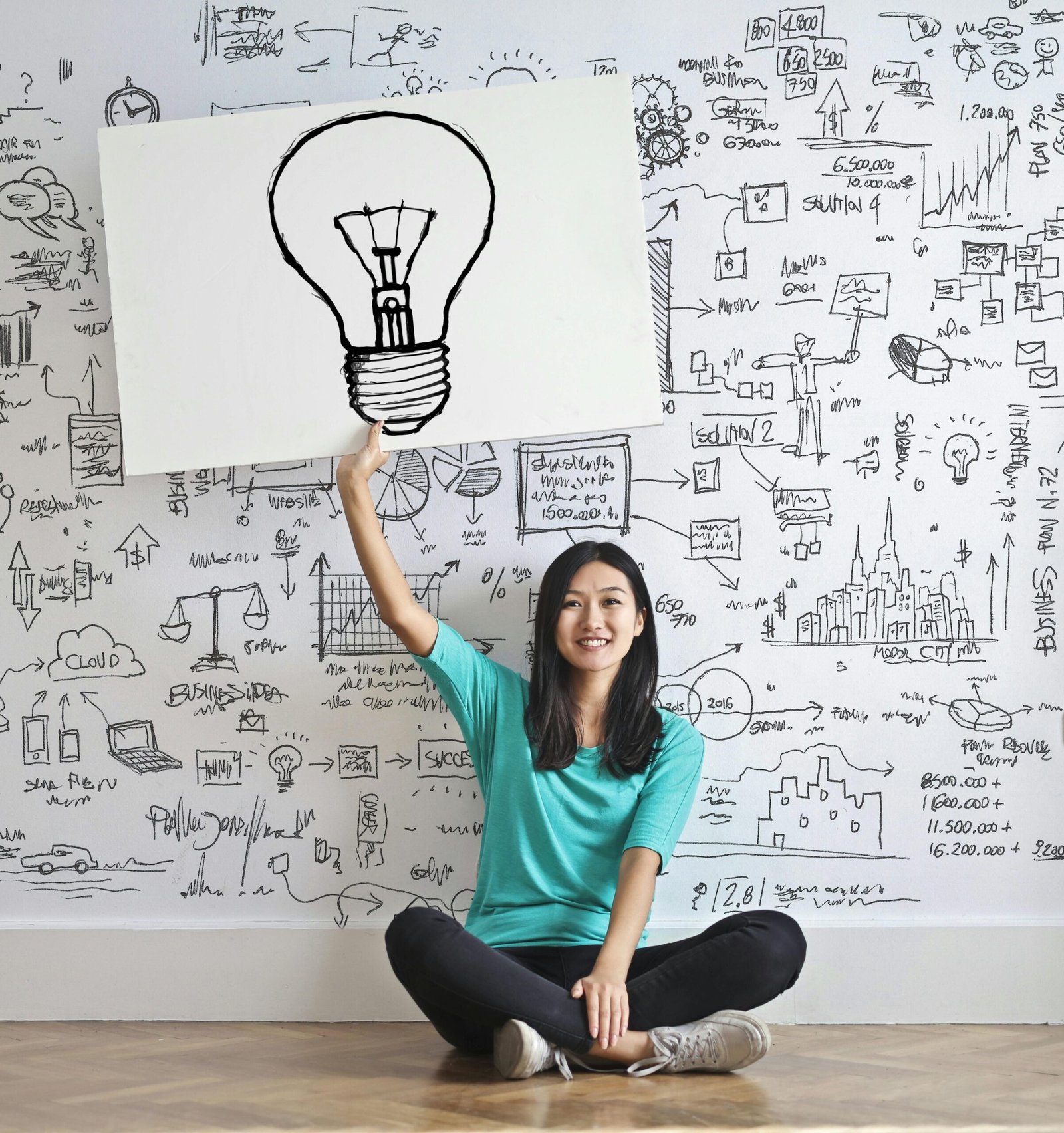 Woman pointing to idea lightbulb illustration